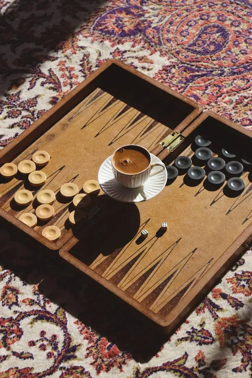 Backgammon board with cup of Turkish coffee